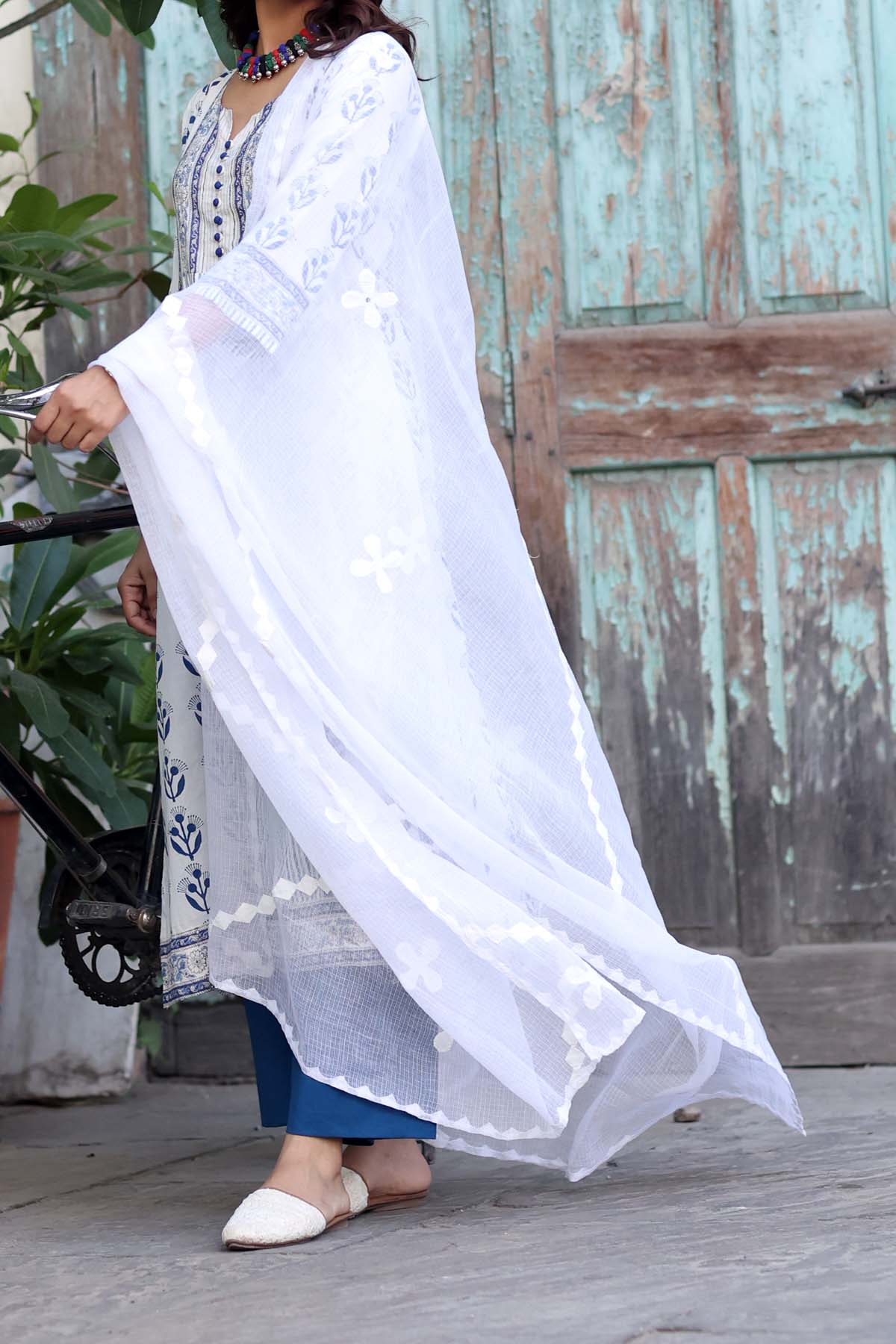 White flared dress with dupatta by Gulaal